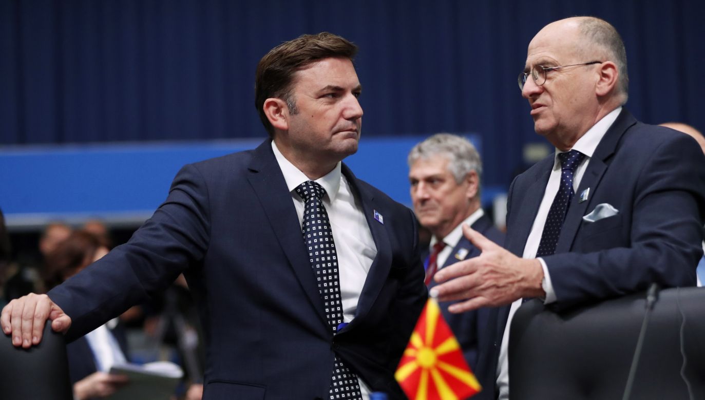 North Macedonia's Foreign Minister Bujar Osmani (L) speaks with Poland's Foreign Minister Zbigniew Rau during the NATO Foreign Ministers Meeting held at Parliament Palace in Bucharest, Romania. Photo: EPA/ROBERT GHEMENT
