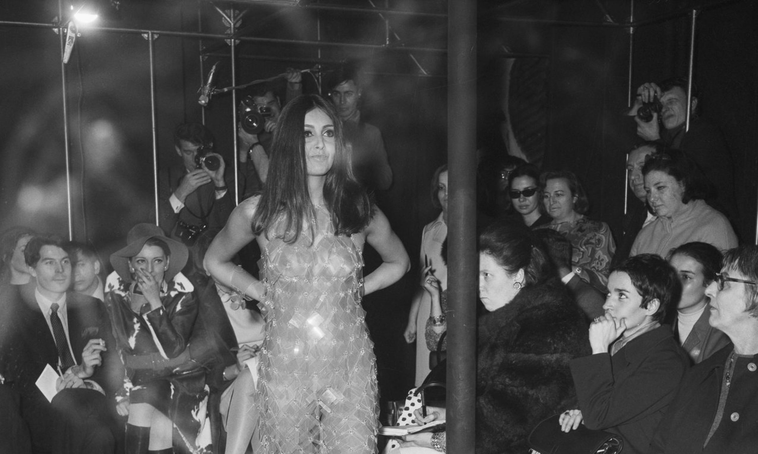 1967: Model in semi-transparent dress. Outfit show from Paco Rabanne's spring/summer collection. Photo: UPI PHOTO/Getty Images